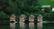 Flam, Norway. Famous Red Wooden Docks In Summer Evening. Small Tourist Town Of Flam On Western Side Of Norway Deep In