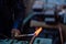 Flame of a copper welding machine heats a copper pipe in a workshop