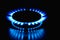 Flame of a gas burner on a black background. Combustion of Natural gas on a black background. Gas stove. Gas stove burner on fire