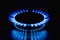 Flame of a gas burner on a black background. Combustion of Natural gas on a black background. Gas stove. Gas stove burner on fire
