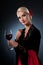 Flamenco dancer holding a glass of wine