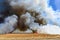 Flames Burning wheat stubble field