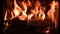 flames in a hot domestic log burner.