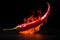 Flames on one red chili on a black background, Generative AI