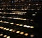 Flames of wax candles during the Eucharistic Celebration in the