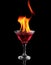 Flaming cocktail over black