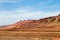 Flaming mountains, Turpan, Xinjiang, China: these intense red mountains appear in the Chinese epic â€œJourney to the westâ€.