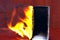 Flaming smartphone. The phone is on fire. Mobile smartphone blank flame