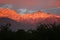 Flaming sunset over snowpeaked Indian himalayas