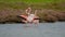 flamingos in their natural environment. A flock of flamingos in saltwater ponds with pumped seawater harbor pine pond