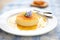 flan with fresh vanilla bean specks, focused on details