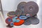 Flap Wheel. A pile of color abrasive sandpaper for metal working