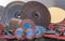 Flap Wheel. A pile of color abrasive sandpaper for metal working