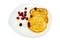 Flapjacks with cranberry and honey in a plate