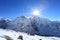 Flare over nuptse summit beside of everest