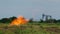 Flare Stack Burning In Oil Well While Producing