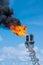 Flare tip of gas processing platform to vent and burn toxic, release gases to safe area