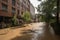 flash flood causes a river to overflow its banks, flooding nearby streets and buildings