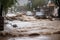 flash flood rushes through town, taking with it debris and vehicles