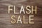 Flash Sale alphabet on wooden background business concept