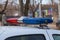 Flasher on a police car. Emergency call symbol. Abstract blurred background with selective focus