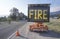 Flashing highway sign: Fire