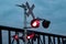 Flashing Railway Crossing With Train Passing