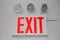 The flashing red security exit sign with three powerful lights