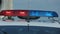Flashing strobe lights bar on police transport, patrol car crime scene, signal