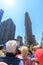 Flat Iron building facade, View from back of top deck on open roofed tour bus in New York