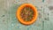 Flat lat or top view of cat diet food in a orange bowl