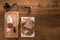 Flat lay above view of dry sausage delicatessen sliced meat with wine and traditional bread on wooden board