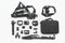 Flat lay of action camera with accessories on white background top view