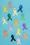 flat lay with arranged colorful ribbons isolated on blue, world health day concept