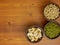 Flat lay assorted beans on wooden table