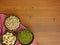 Flat lay assorted beans on wooden table