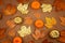 Flat lay autumn composition with fall yellow and golden leaves and pumpkins