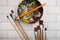 Flat lay background with multiple sized art paintbrushes