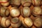 Flat Lay Baseball Still life. A high angle shot of a dozen used baseballs on a wood surface with warm side light