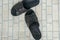Flat lay black men leather slippers shoes