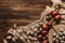 flat lay with chicken and quail easter eggs on gauze on wood background