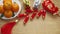 Flat lay Chinese new year festival decorations with orange apple grape and red packet.