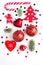 Flat lay Christmas composition with heart, branch, Christmas candy, stripes, Christmas tree, ball, angel, bell and