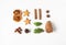 Flat lay Christmas composition - star cookie, cinnamon, anise star, nuts, dry orange slices, anise star, pine cone and fir