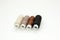 Flat lay colorful cotton thread spools, embroidery yarn, white, brown, black, bobbins, mock up, top view. Layout mockup, blank