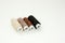 Flat lay colorful cotton thread spools, embroidery yarn, white, brown, black, bobbins, mock up, top view. Layout mockup, blank