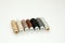 Flat lay colorful cotton thread spools, embroidery yarn, white, brown, gray, black, silver, gold bobbins, mock up, top view.