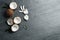 Flat lay composition with coconuts on grey table.