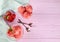 Flat lay composition with delicious strawberry ice cream on pink wooden table