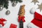 Flat lay composition with guitar and Santa hat on white. Christmas music